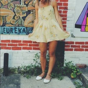 Floral yellow romper
